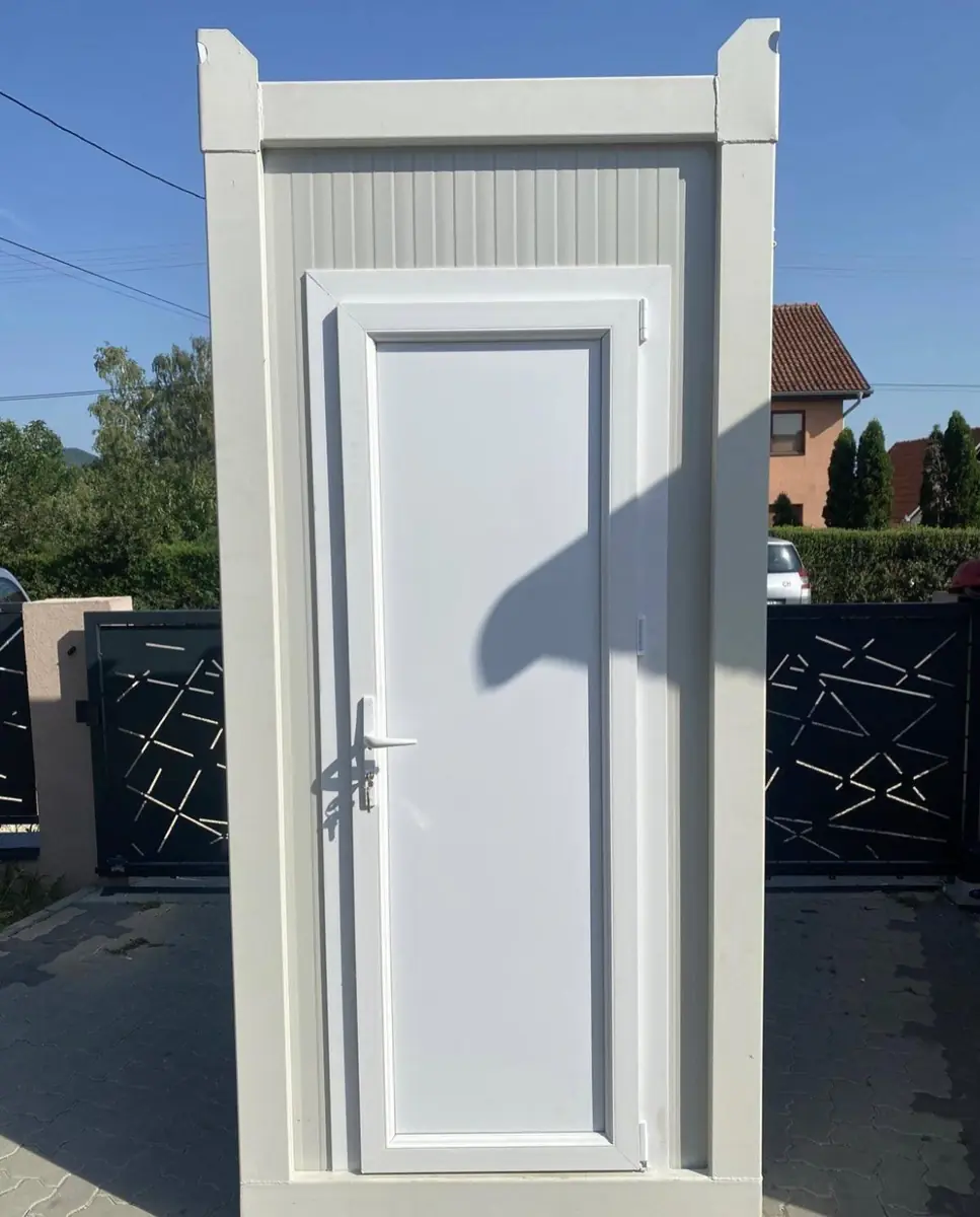 White flushing VIP restroom cabin